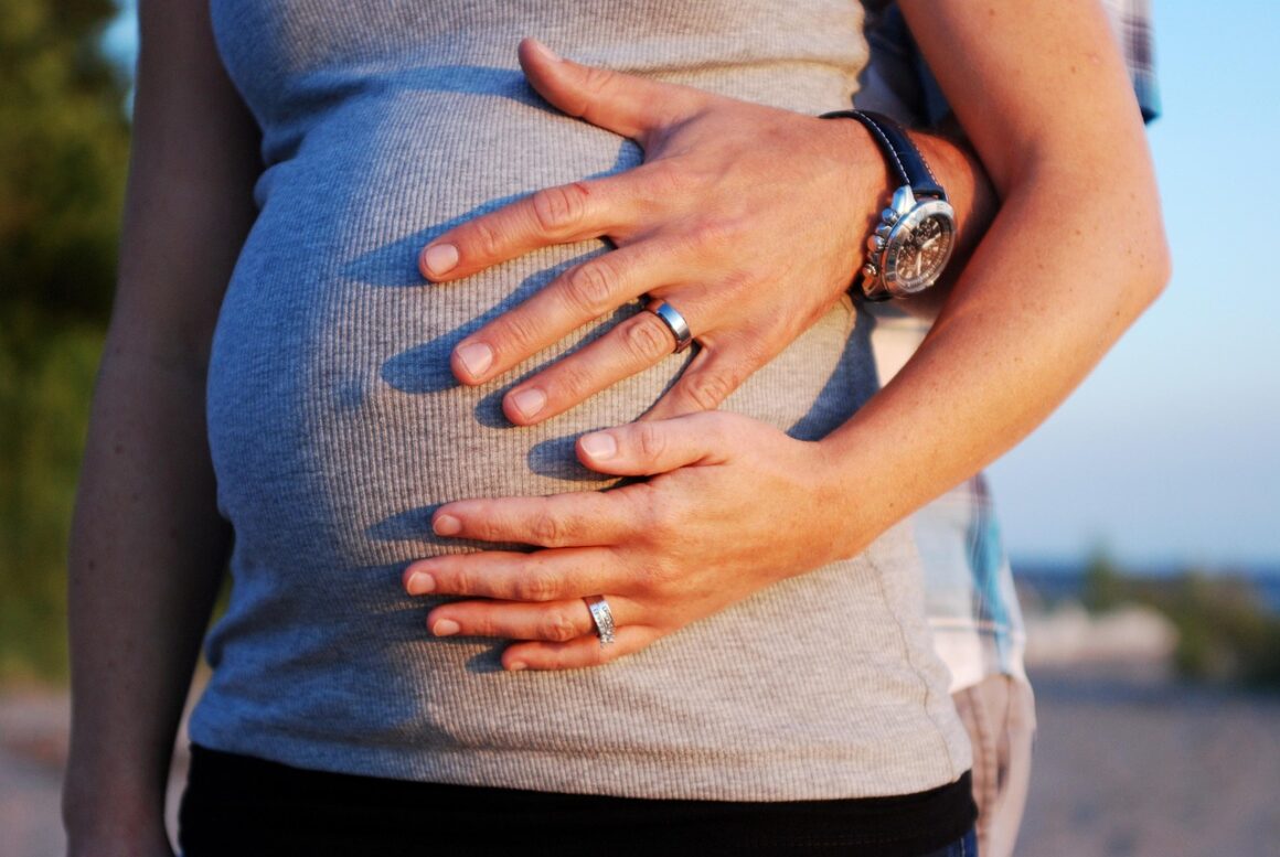 a close-up of a pregnant woman's belly